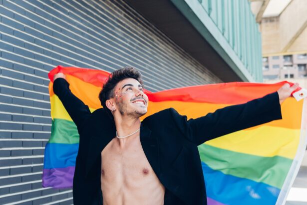 Smiling gay with LGBT flag