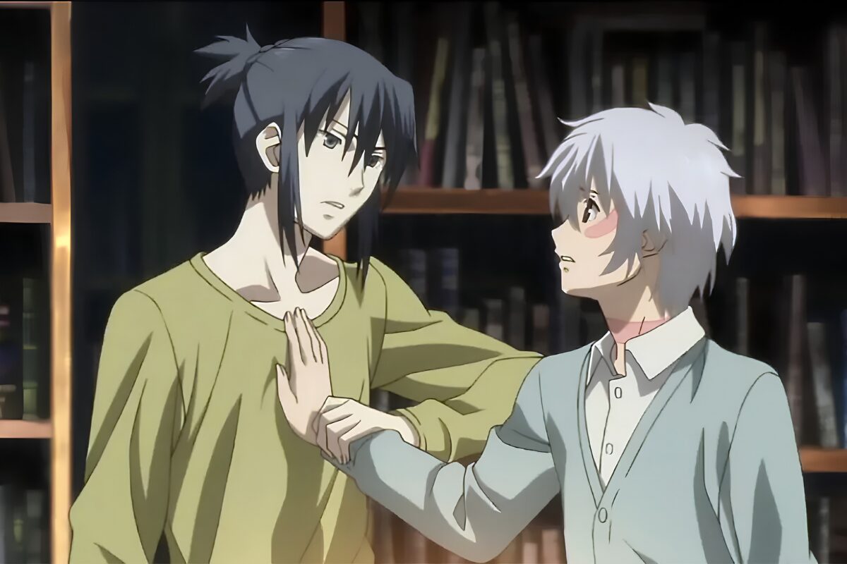 Shion, right, presses his right hand against Nezumi’s chest. Shion looks upset and Nezumi is about to remove said hand with his left arm