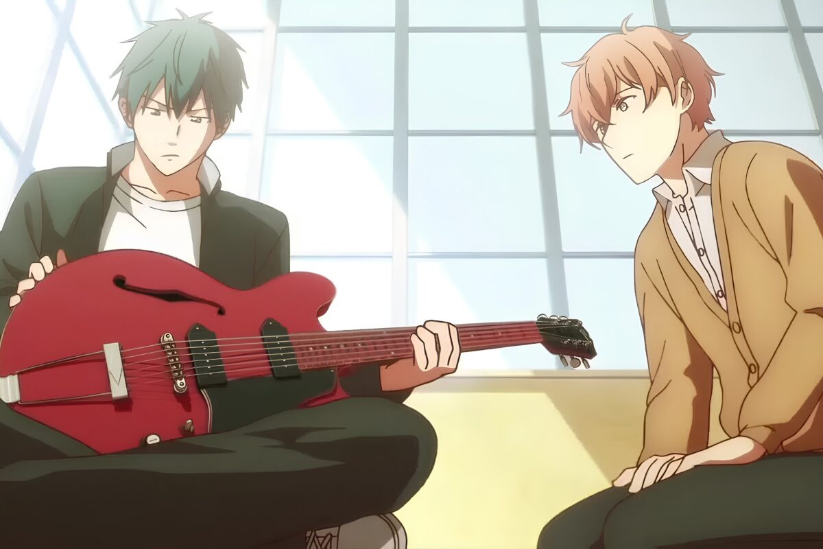 Ritsuka, left, sits cross-legged with a red guitar in his lap. Mafuyu, sat in a seiza-position, looks on