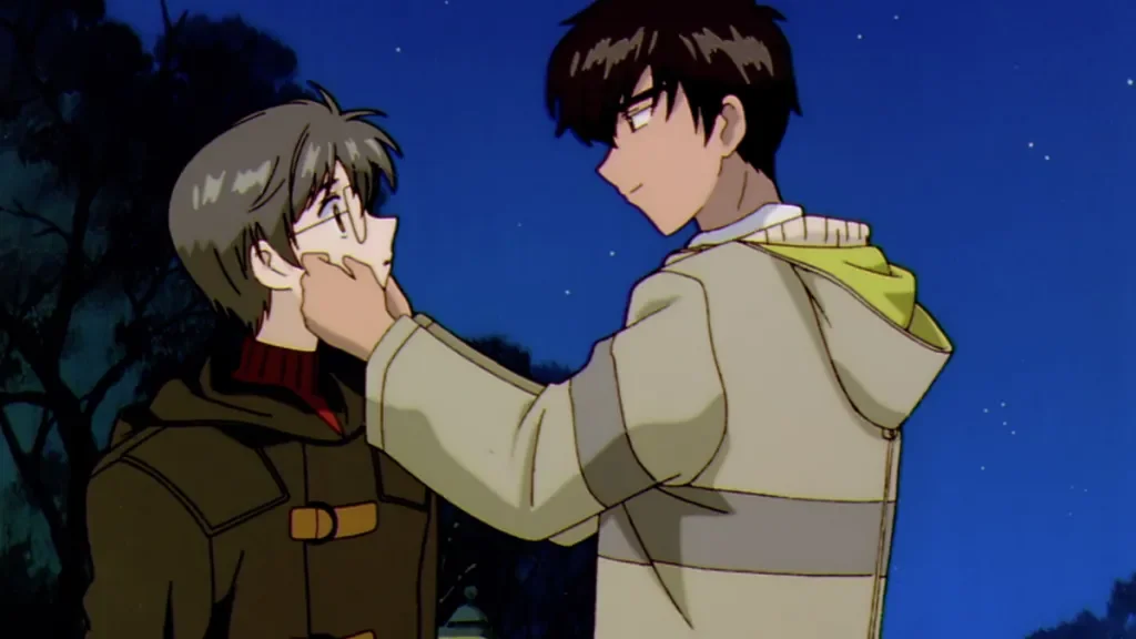 Touya Kinomoto, right, gently holds Yukito Tsukishiro’s face with both hands on each side