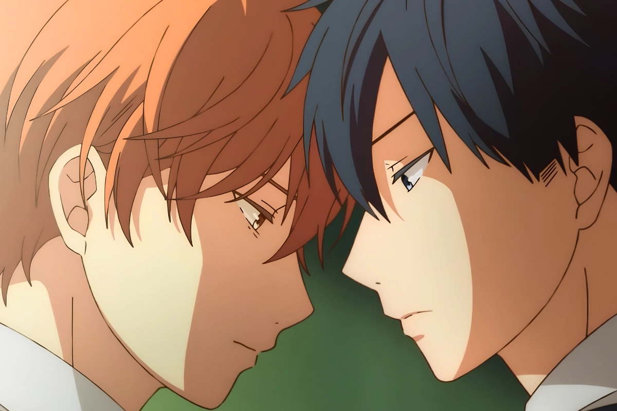 Two young men lean their foreheads together in a quiet, emotional moment lit by warm evening light.