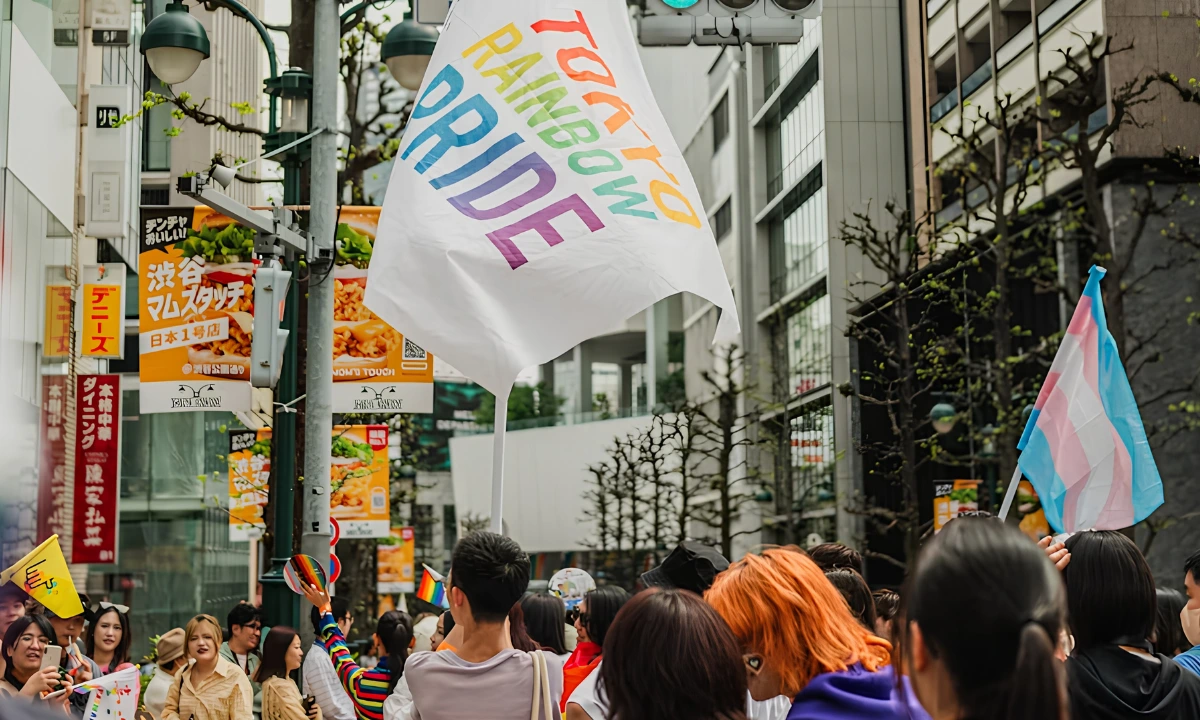 Tokyo Rainbow Pride parade is walking through the streets waving different pride flags