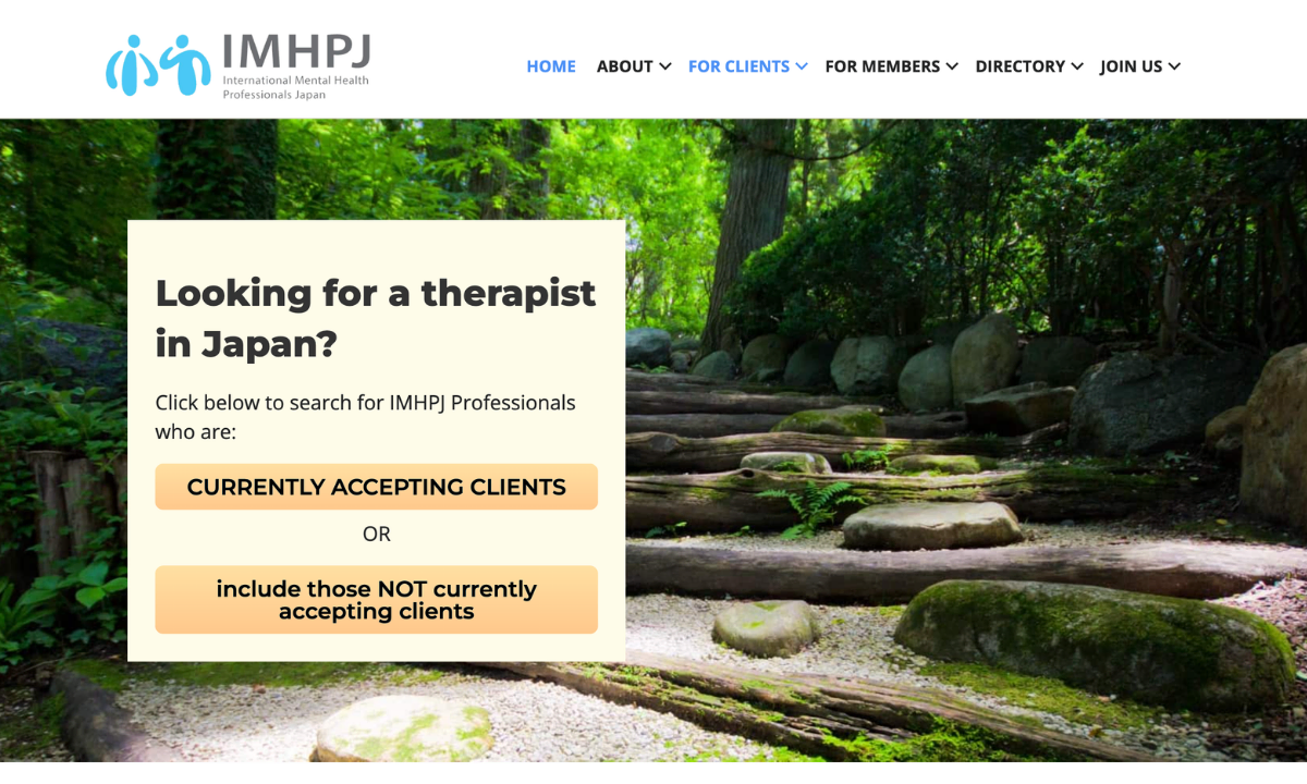 Screenshot of the International Mental Health Professionals Japan website, showing a therapist search tool over a photograph of a wooded Japanese garden.
