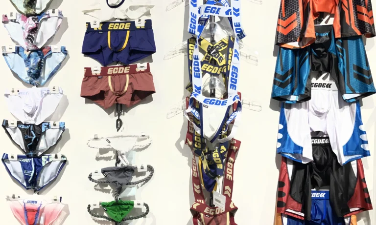 Various types of underwear displayed on hangers.
