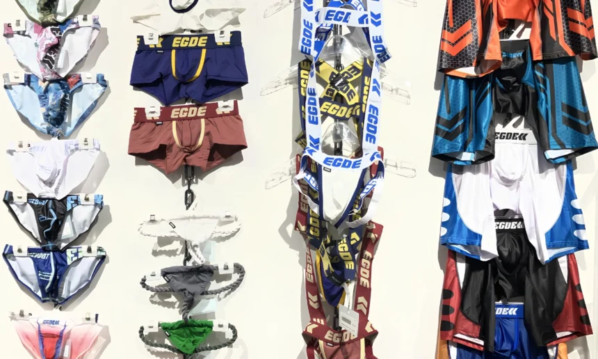 Various types of underwear displayed on hangers.