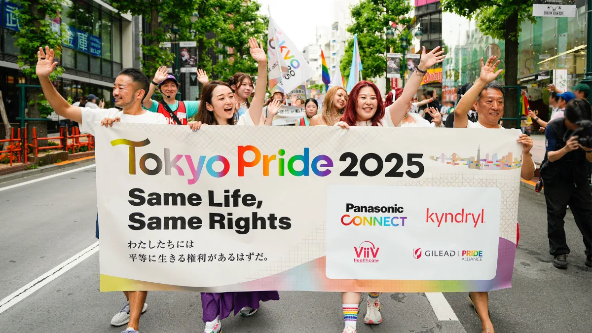 Marchers leading the Tokyo Pride Parade, carrying the official event banner reading "Tokyo Pride 2025 Same Life, Same Rights." This vibrant Tokyo Rainbow Pride festival image captures the community advocacy and celebration in Japan.