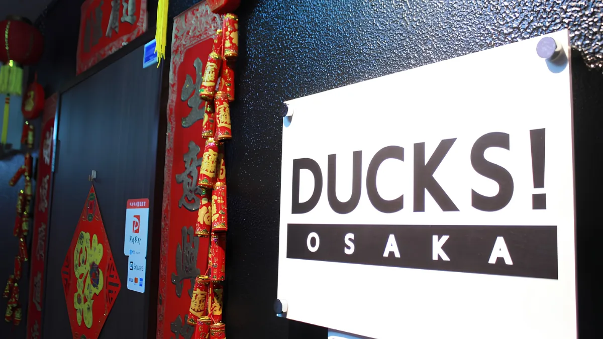 Image of sign at entrance to DUCKS! OSAKA.