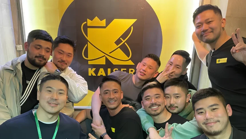 Image of staff and visitors to Kaiser bar in Shinjuku Nichome.
