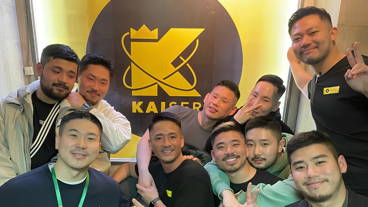 Image of staff and visitors to Kaiser bar in Shinjuku Nichome.