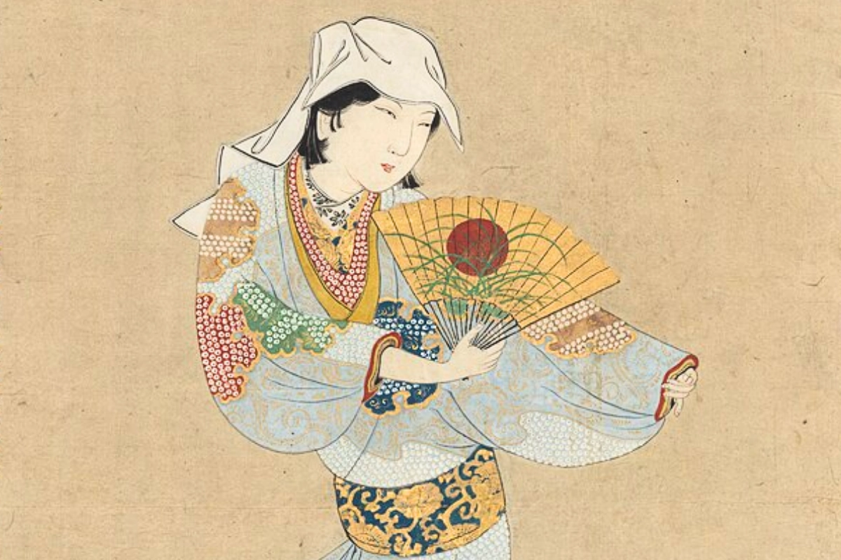 A wakashu dancer is seen dancing while holding a fan, with a white kerchief covering their hair. Created by an unidentified artist