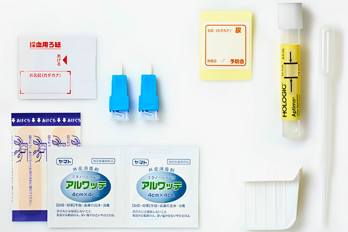 Where to Get STI/STD Testing in Japan: Public Centers, Clinics & Mail-in Tests 13 Blood and urine collection materials from a Japanese mail-in STI testing kit.